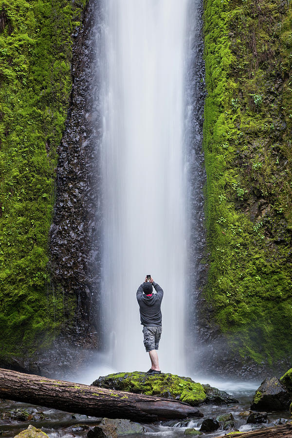 A Man Photographing a Waterfall Photograph by Nicole Young