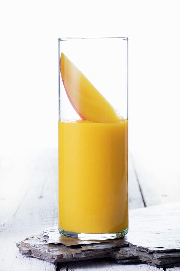 A Mango Smoothie Photograph by Jan Prerovsky