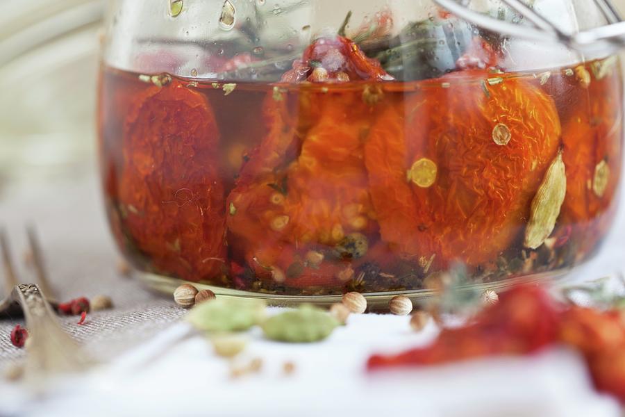 A Marinade Made From Dried Tomatoes, Olive Oil And Rosemary close-up Photograph by Isolda Delgado Mora