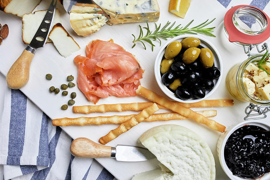 A Mediterranean Appetizer Platter With Cheese, Salmon, Olives And Bread Sticks Photograph by Natasa Dangubic