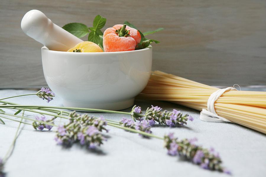 A Mediterranean Arrangement Featuring Lavender And Pasta Photograph by Viola Cajo