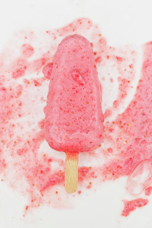 A Melting Strawberry Ice Cream Stick Photograph by Esther Hildebrandt