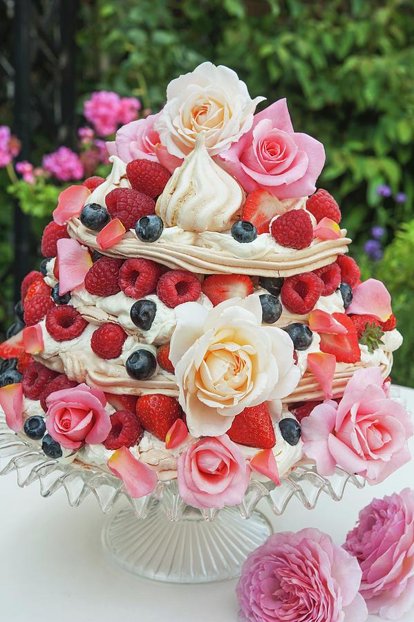 A Meringue Cake With Berries And Flowers Photograph by Linda Burgess