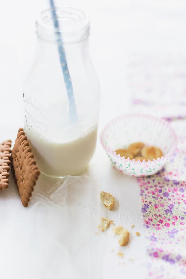 A Milk Bottle With A Straw With Butter Biscuits And Crumbs It Photograph by Au Petit Gout Photography Llc