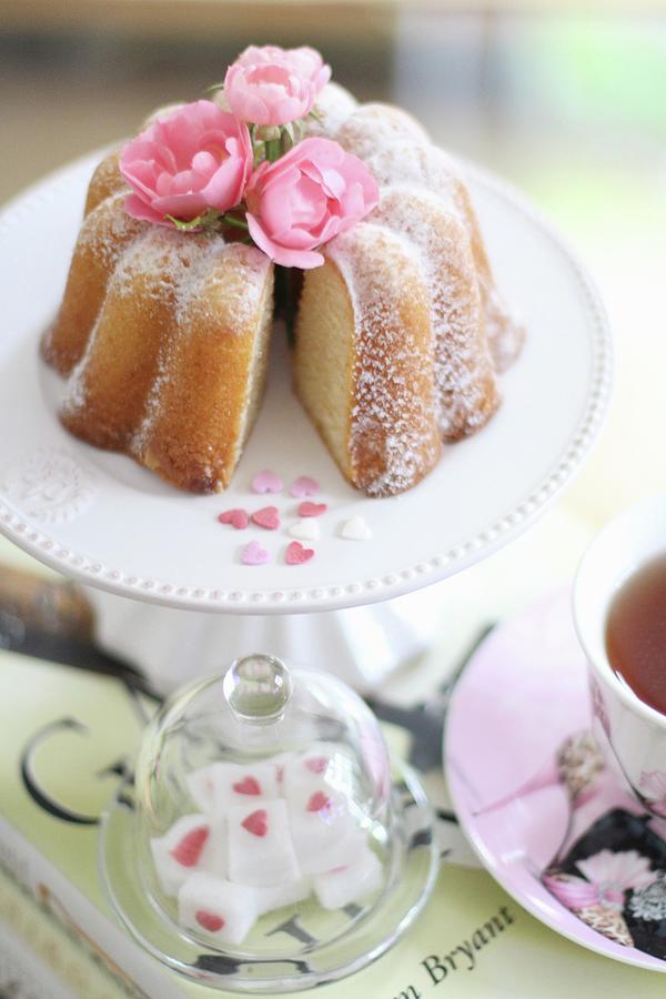 A Mini Bundt Cake And A Cup Of Tea Photograph by Sylvia E.k Photography
