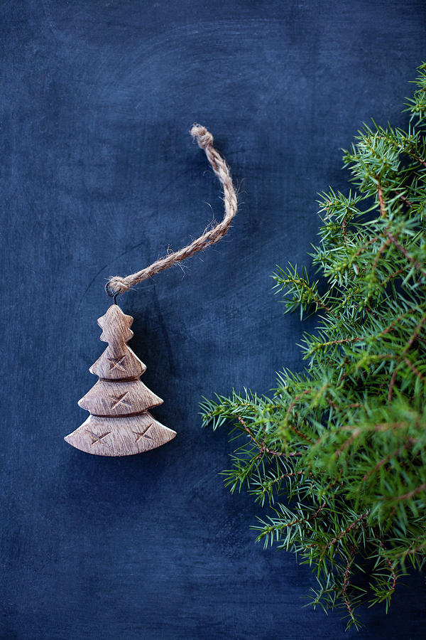 A Mini Carved Christmas Tree Decoration Photograph by Alicja Koll
