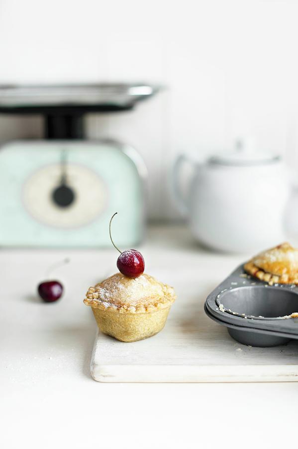 A Mini Cherry Pie Made In A Muffin Tin Photograph by Magdalena Hendey