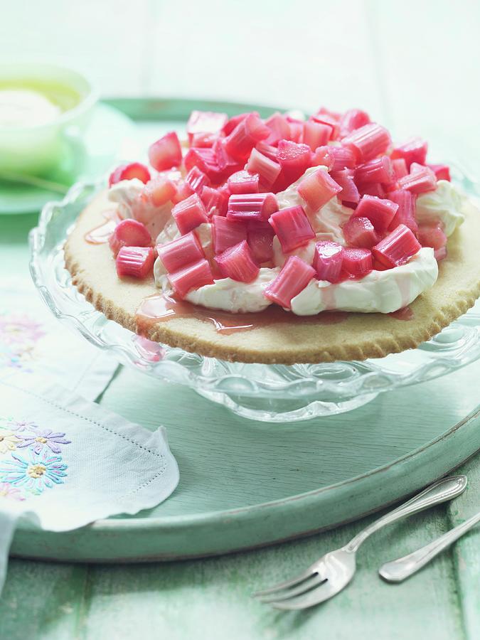 A Mini Shortbread Cake Topped With Whipped Cream And Rhubarb Photograph by Jonathan Gregson