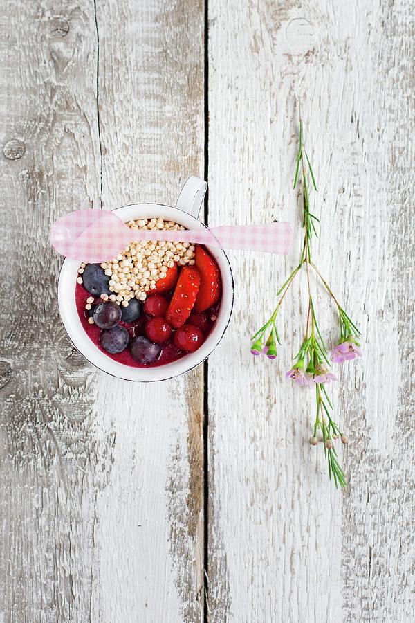 A Mini Smoothie Bowl In A Cup With Berries And Popped Amaranth Photograph by Tina Engel