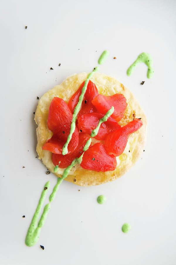 A Mini Tomato Pizza With Goats Cheese Coriander Pesto Photograph by Michael Wissing
