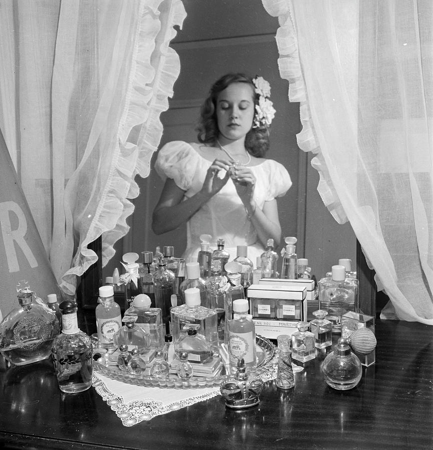 Tulsa Photograph - A mirror reflection of a teenage girl in a room in Tulsa, OK in 1947. by Nina Leen
