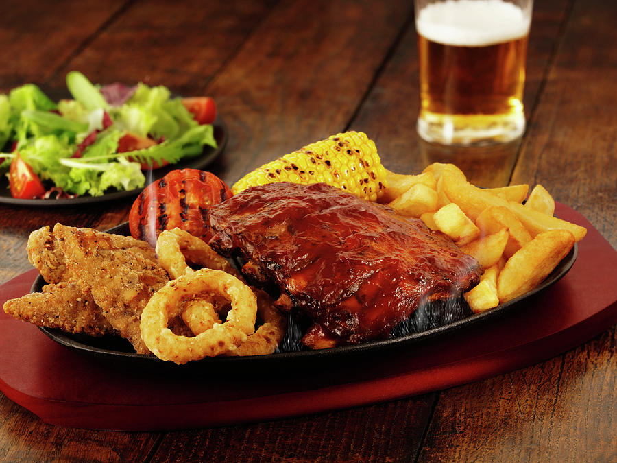 A Mixed Grill Platter Featuring Chicken, Spare Ribs, Chips And Beer Photograph by Frank Adam