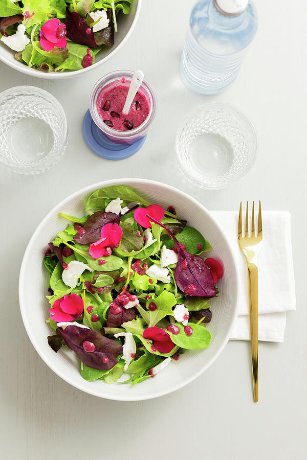 A Mixed Leaf Salad With Flowers And A Pomegranate Dressing Photograph by Maria Panzer