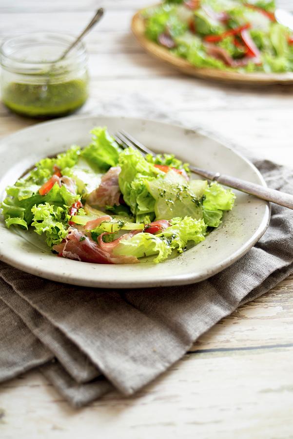 A Mixed Leaf Salad With Star Fruits And Ham Photograph by Clara ...