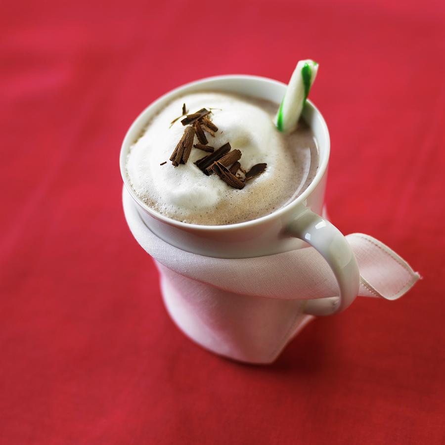 A Mug Of Hot Chocolate With Milk Foamy, Grated Chocolate And A Candy Cane Photograph by Vincent Noguchi Photography
