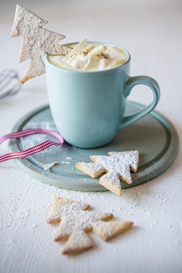 A Mug Of White Hot Chocolate With Christmas Tree Biscuits Photograph by Magdalena Hendey