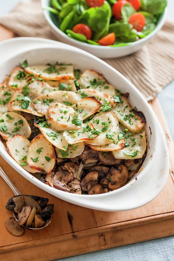 A Mushroom And Potato Bake With Herbs Photograph by Andrew Young