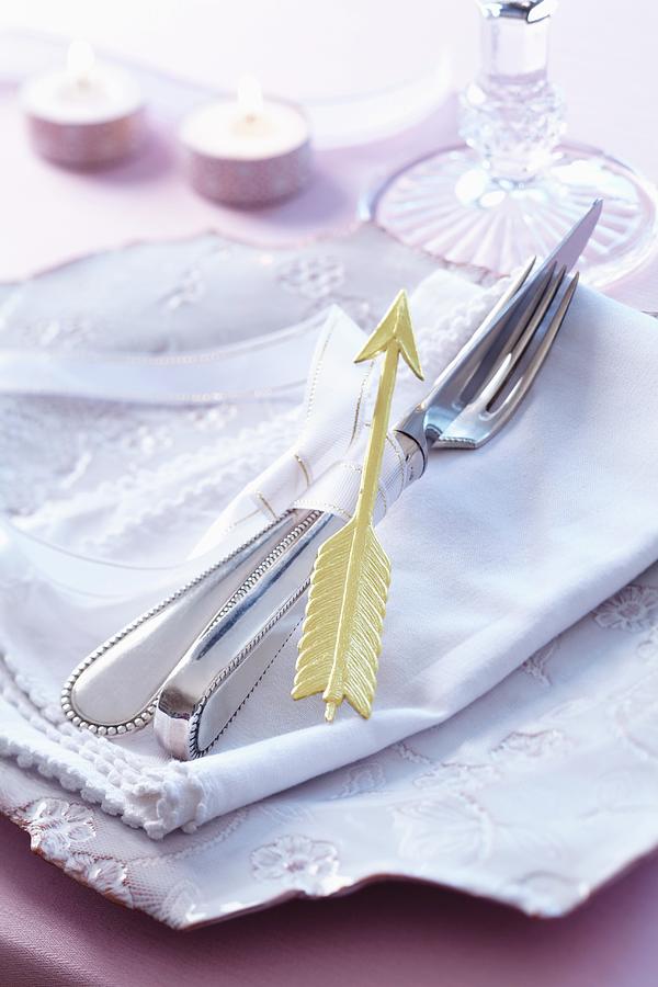 A Napkin Concept With A Ribbon And Cupids Arrow Photograph by Taube, Franziska