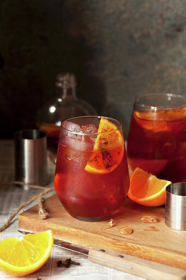 A Negroni With Roasted Oranges And Spices Photograph by Jane Saunders