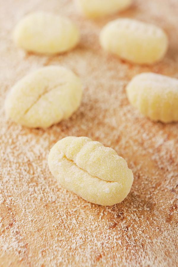 A Number Of Fresh Gnocchi With Flour Photograph by Stiller, Younes