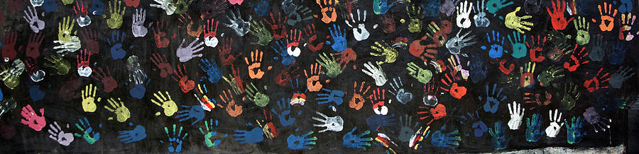A Painting Of Colorful Handprints Photograph by Khananastasia