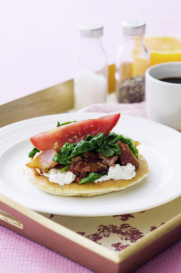 A Pancake Topped With Ricotta, Spinach And Pancetta, For Breakfast Photograph by Young, Andrew