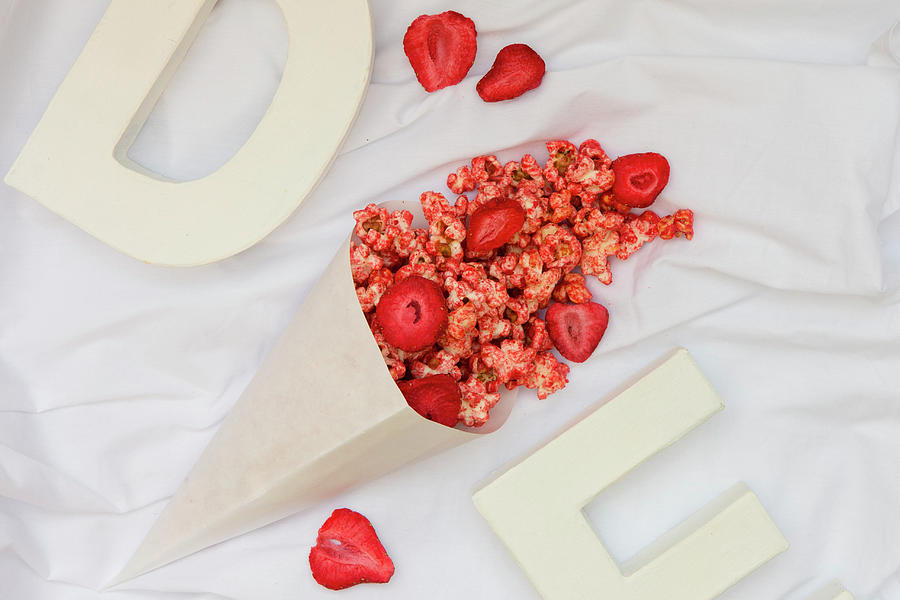 A Paper Cone With Strawberry Popcorn seen From Above Photograph by Esther Hildebrandt