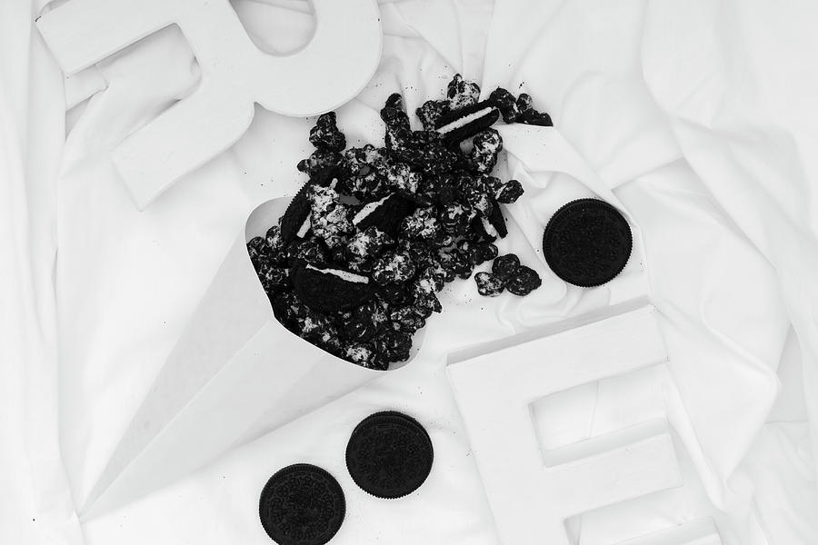 Popcorn Photograph - A Paper Corn With Oreo Popcorn And Oreo Cookies seen From Above by Esther Hildebrandt