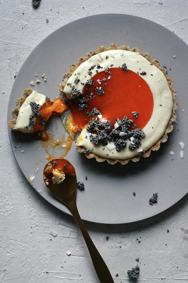A Partially Eaten Apricot And Poppy Seed Tart Photograph by Pilar Felix