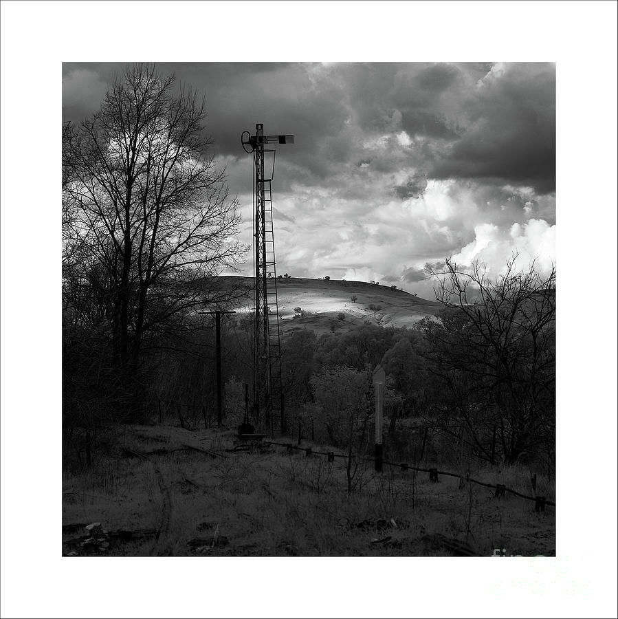 A patch of light on a distant hill by Russell Brown A patch of light on a distant hill by Russell Brown
