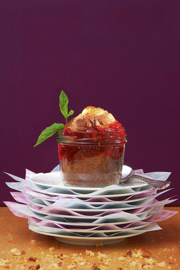 A Pecan Nut Muffin With Raspberry Jam In A Glass Jar Photograph by Hugo Monteros