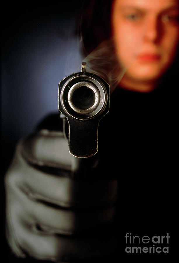 A Person Holding A Smoking Gun Photograph by Oscar Burriel/science Photo Library