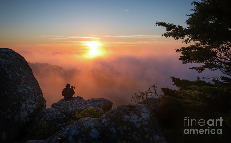 A Photographer Sitting On A High Rock Photograph by Jorge Veloso