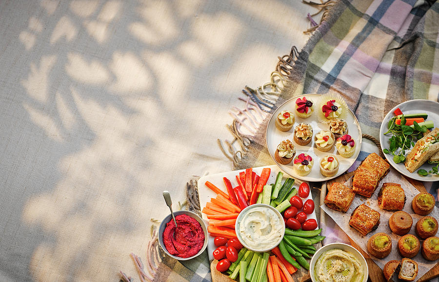A Picnic With Crudites, Pastries And Sandwiches Photograph by Gareth Morgans