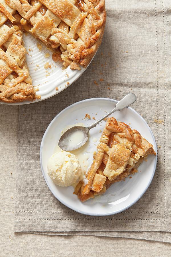 A Piece Of Apple Pie With Vanilla Ice Cream On A Plate top View Photograph by Stacy Grant