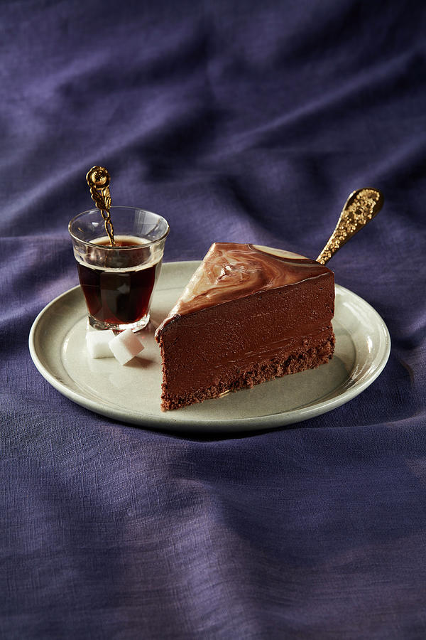 A Piece Of Chocolate Mousse Cake With Coffee Photograph by Rafael Pranschke