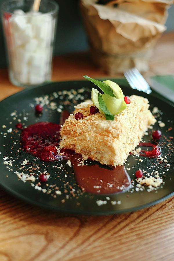 A Piece Of Coconut Cake With Redcurrants And Mint Ice Cream Photograph by Kuzmin5d
