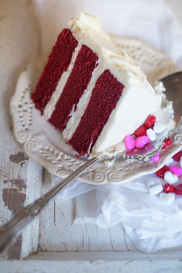 A Piece Of Red Velvet Cake And Heart Drops Photograph by Eising Studio ...