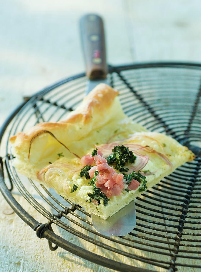 A Piece Of Tarte Flambe With Ground Elder And Smoked Salmon Photograph by Andreas Thumm