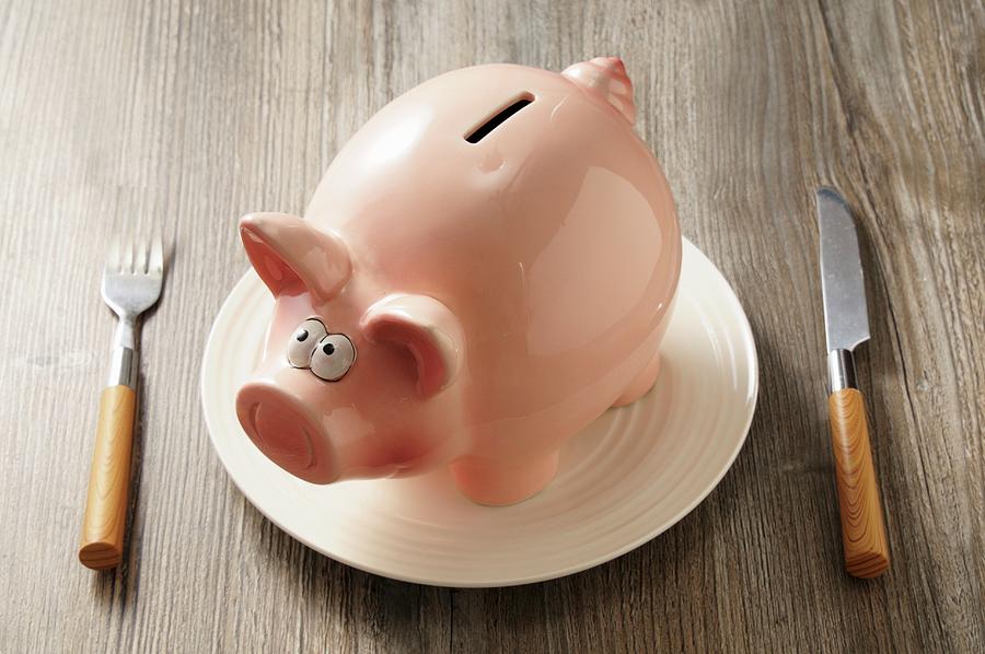 A Piggy Bank On A Plate Photograph by Jean-christophe Riou