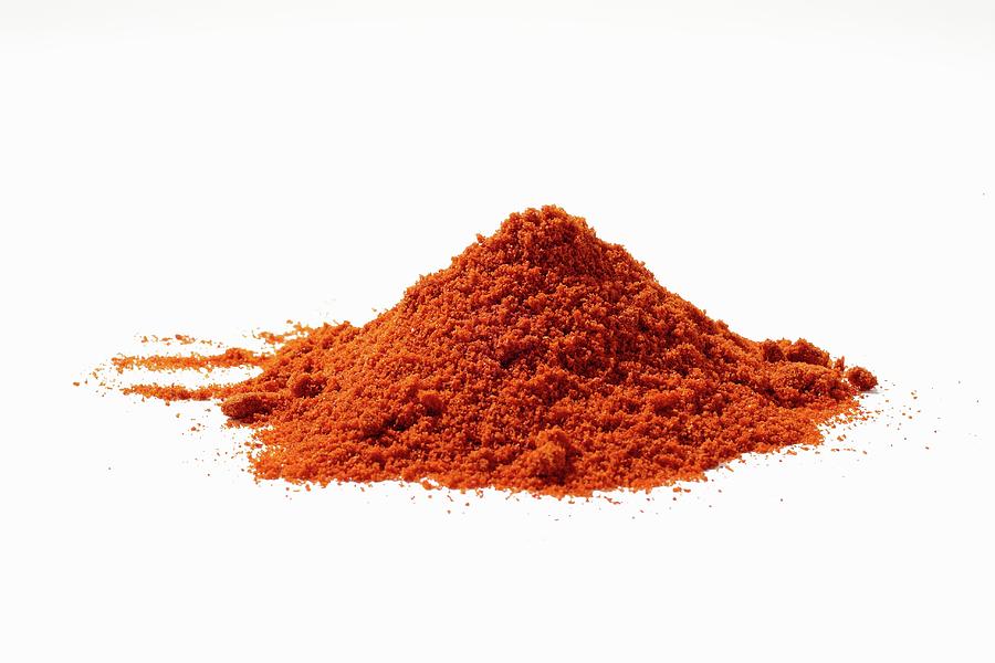 A Pile Of Allspice Powder Photograph by Alessandra Pizzi