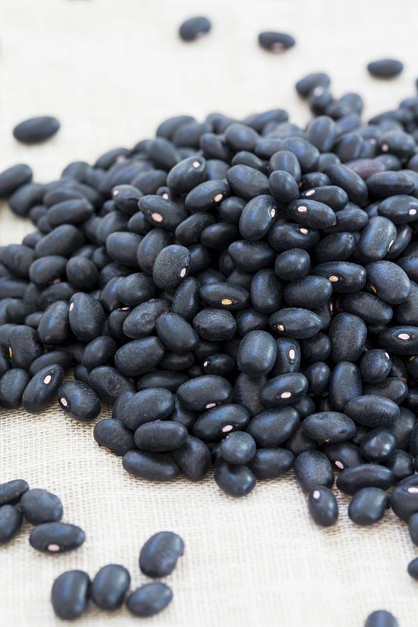 A Pile Of Black Beans Photograph by Lydie Besancon