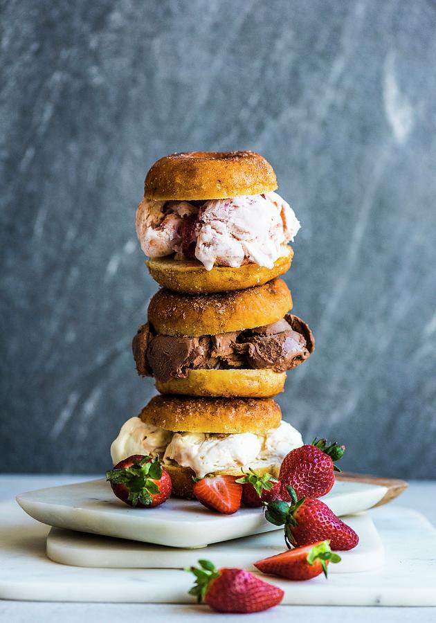 A Pile Of Doughnut Ice Cream Sandwiches With Strawberries Photograph by Hein Van Tonder