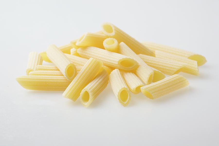 A Pile Of Fresh Penne Rigate Pasta Photograph by John Gagne