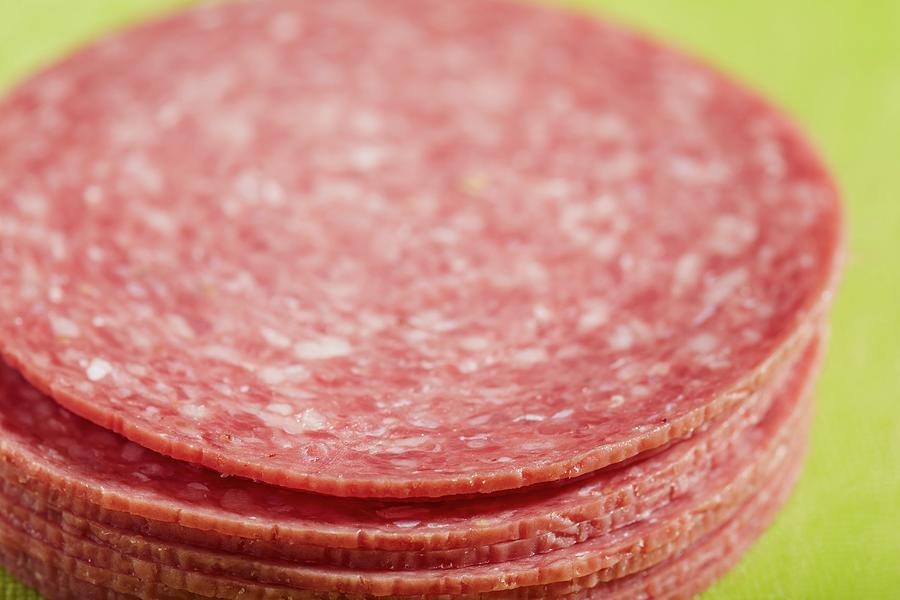 A Pile Of Slices Of American Beef Salami Photograph by Brian Yarvin