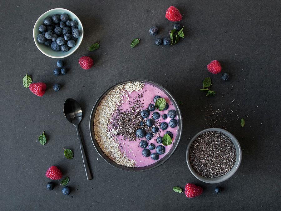 A Pink Smoothie Bowl With Berries And Gluten-free Millet Flakes seen From Above Photograph by Freiknuspern