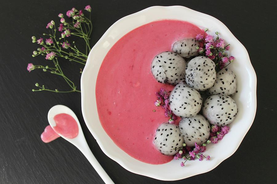 A Pink Smoothie Bowl With Dragon Fruit Balls Photograph by Esspirationen
