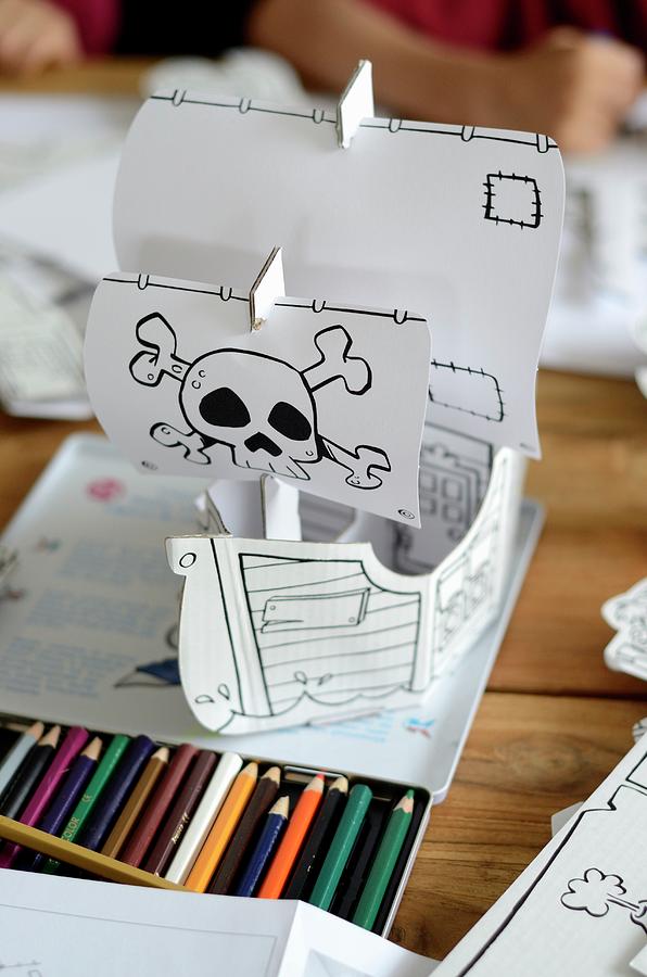 Crayon Photograph - A Pirate Boat Crafted Out Of Paper by Chatelain, Sonia