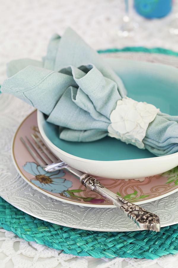 A Place Setting With A Fabric Napkin In A Napkin Ring Photograph by Great Stock!