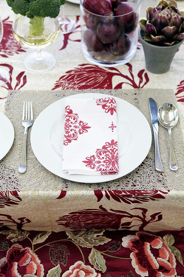 A Place Setting With A Red And White Fabric Napkin Photograph by Great Stock!